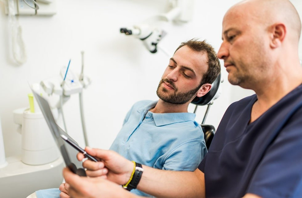 explications pose d'un implant dentaire